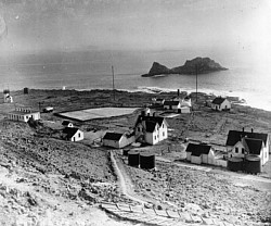 All the buildings in the SEFI colony in 1944. The three keepers' gingerbread houses and various army huts.