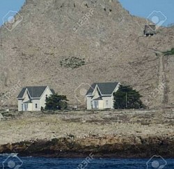 Restored gingerbread houses now used by birdwatching scientists.